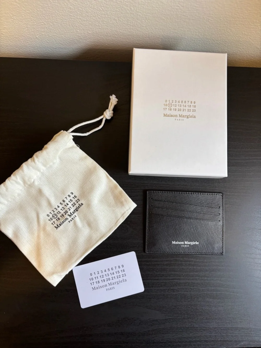 Maison margiela black leather cardholder holds 4 cards